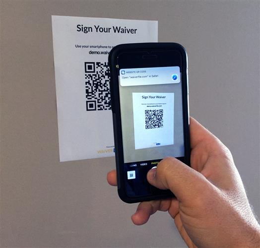 Scanning Waiver Form QR Code on an iPhone